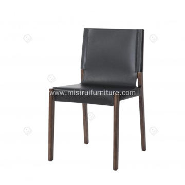 Black saddle leather armless wooden feet dining chairs
